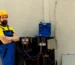 Technician repairing compressor
